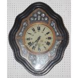 A French ebonised shaped case wall clock with mother-of-pearl inlaid dial, 24" high