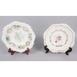 A Rockingham tureen stand, decorated ornate shell and gadroon border, centre painted floral