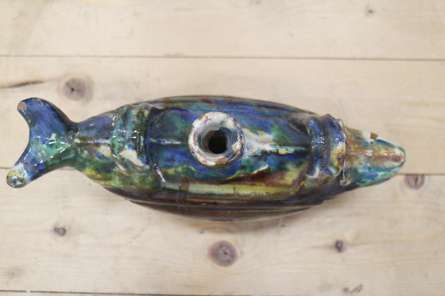 An Ottoman ceramic bottle, formed as a fish, with blue and green splashed glaze, 11 1/2" wide - Image 3 of 4