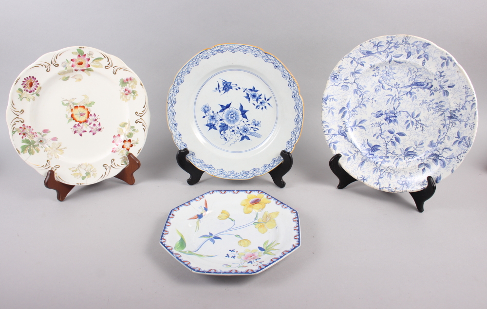 A Rockingham china floral decorated and gilt plate, two Brameld blue and white floral decorated