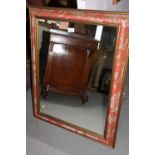 A painted framed wall mirror, plate 25 1/2" x 19 1/2"