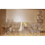 A part suite of Edwardian drinking glasses with cut and engraved decoration, and a thistle-shaped