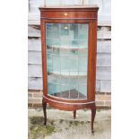 A late 19th century mahogany and box inlaid bowfront corner display cabinet enclosed leaded glazed