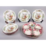 A set of nine Copeland Spode dessert plates, transfer decorated pheasants in a flowering bush,