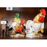 A pair of Continental models of cockerels, 7 3/4" high, a Staffordshire model of a swan and a