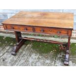 A Regency rosewood centre table, fitted two drawers, on shaped panel end supports and turned feet,