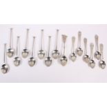 A set of six silver coffee spoons with pierced handles, a set of eight silver teaspoons one other