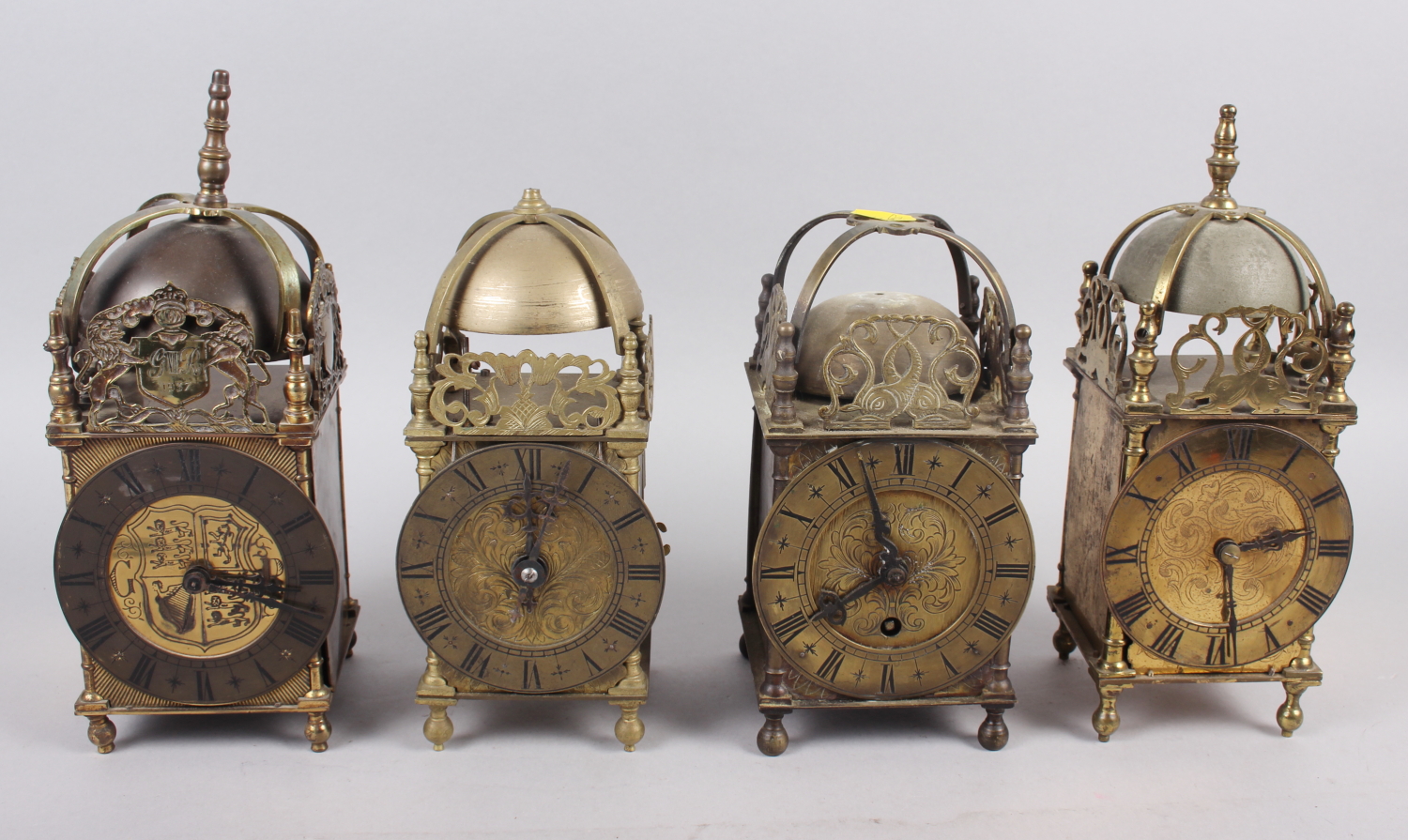 Four French reproduction brass lantern clocks, 10" high