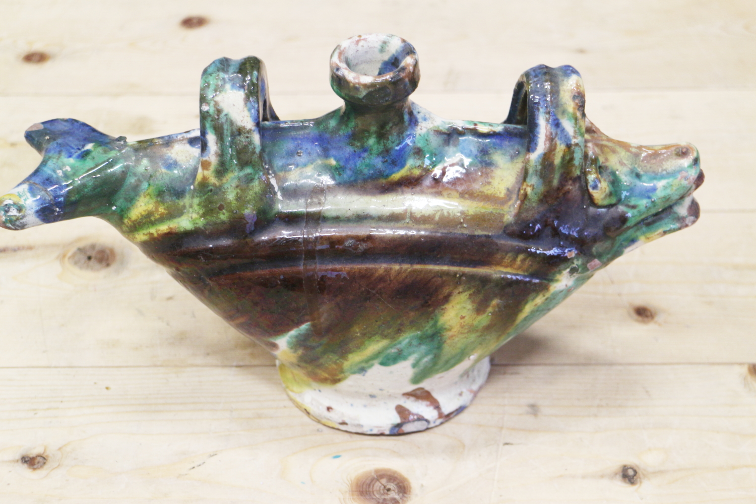 An Ottoman ceramic bottle, formed as a fish, with blue and green splashed glaze, 11 1/2" wide - Image 2 of 4