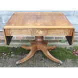 A Regency rosewood box and ebony line inlaid sofa table with floral marquetry panels, fitted two