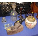 An assortment of items, including a wood working plane, a biscuit barrel, a hardstone model of a