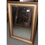 A wall mirror, plate 13" x 21", in gilt frame