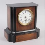 A mahogany and ebonised cased mantel clock with white enamel dial and Roman numerals, 8 1/2" high