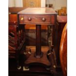 A Victorian mahogany flap top work table, fitted one drawer, on faceted column and quatreform