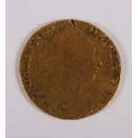 A George III gold guinea, 1779, 8.1g