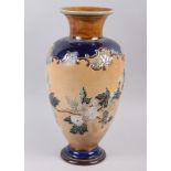 A Doulton Lambeth floral decorated baluster vase, 13 1/2" high