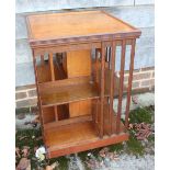An oak revolving bookcase, 21" square