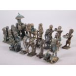 A collection of Ashanti bronze gold weight figures