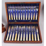 An oak canteen of twelve fish knives and forks, and a mahogany box