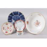 An 18th century Delft plate with vase of flowers decoration, 8 1/2" dia (rim chips), a cabinet cup