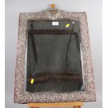 An early 20th century silver scrollwork framed easel dressing mirror, 24" high