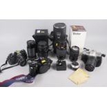 A Canon EOS 500 35mm camera, a Pentax MZ-5N SLR camera, a Centon SLR camera, three Pentax K