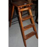 A Slingsby three-step step ladder, 28 1/4" high