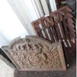 A 19th century cast iron fireback, decorated crown and armorial, 22" square, and an iron fire grate