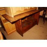 A fruitwood drop leaf side table, fitted two lift-up compartments, on panel end supports, 52" wide x