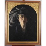 An oil on canvas portrait of a 1920s woman, 19" x 14 3/4", in gilt arch top frame