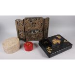 A Japanese black and gilt lacquered box and cover, 11 1/2" wide, another similar, two other Oriental