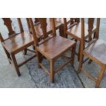 A set of six 19th century fruitwood vase splat-back side chairs with panel seats, on moulded and