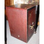 An early 20th century safe with key, 13" wide x 13" deep x 20" high