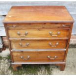 A bachelor's 19th century mahogany chest of three long drawers with brush slide, on bracket