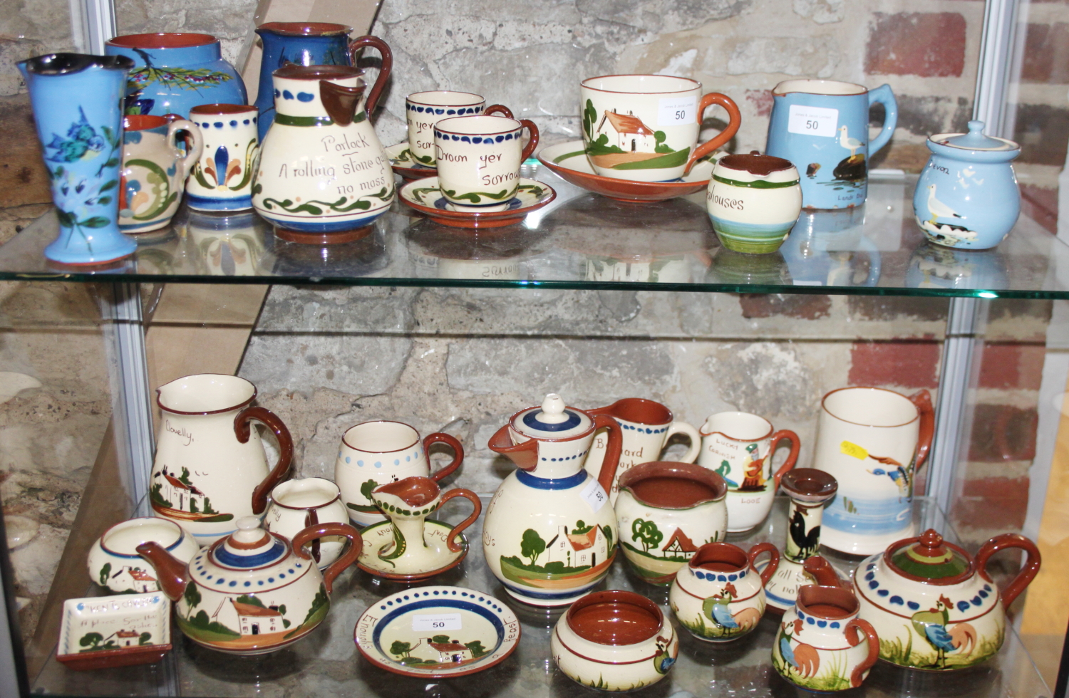 A collection of thirty-two pieces of Torquay Devon and other Cornish wares, various