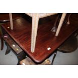 A William IV mahogany drop leaf dining table, on turned column and quadruple splay supports, 48"