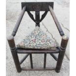 A 19th century Welsh turned and carved turner's chair with triangular panel seat, 21 1/2" wide