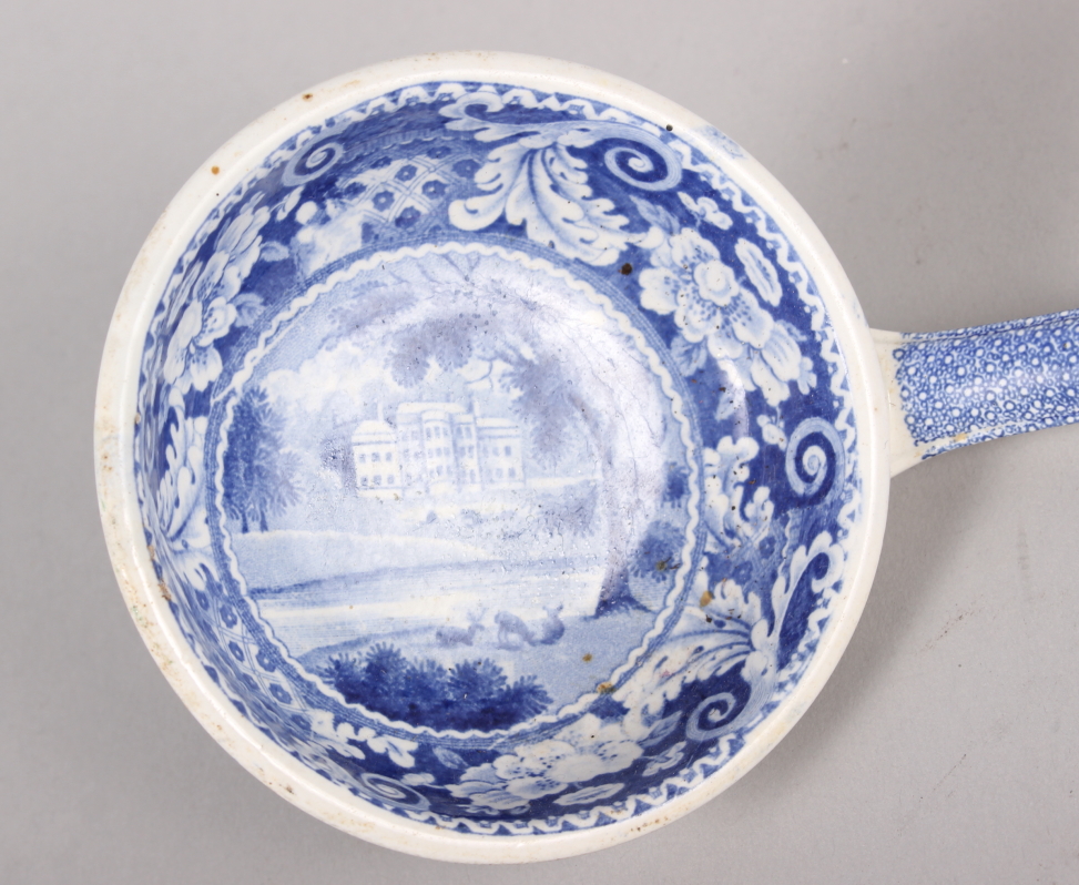 A 19th century blue and white ladle, decorated house in a landscape, 13" long overall - Image 2 of 3