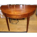 A mahogany demi-lune table, on square taper supports, 42" wide