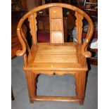 A Chinese elm armchair with curved back and panel seat, on square taper supports, 30" wide max