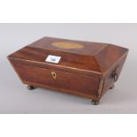 A 19th century mahogany and inlaid sarcophagus workbox with ring handles, on ball feet, 11" wide