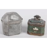 An early 19th century lead tobacco jar with Prince of Wales feather decoration, 4 1/2" high, and