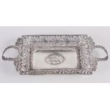 A Continental two-handle white metal bonbon dish with wheatsheaf decoration