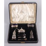 A silver cruet set, in fitted case, 5.2oz troy approx