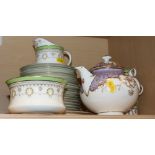 A Couldron green bordered gilt and wreath decorated part teaset and a Coalport floral decorated