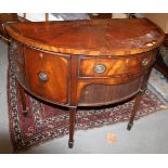 A George III mahogany banded and inlaid bowfront sideboard, fitted central drawer flanking cupboards