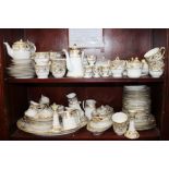 A Noritake 44318 pattern part combination service, comprising three coffee pots, a cheese dish,