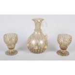 A pair of Venetian gold and clear glass aventurine goblets and a matching jug, 6 3/4" high