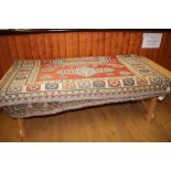 A Caucasian tribal flatweave rug with central octagonal medallion on a red ground, 64" x 70" approx