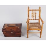 A doll's turned wood spindle back chair with cane seat, 12" high, and a rosewood sarcophagus tea